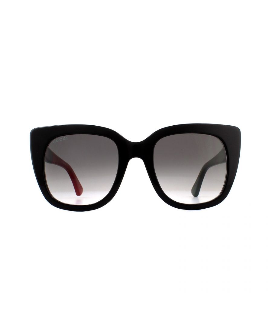 Gucci Sunglasses GG0163S 003 Black with Red and Green Brown Gradient are a sophisticated square cat eye style crafted from thick acetate. Temples feature the Gucci interlocking GG logo as well as the bumblebee motif at the temple tips.