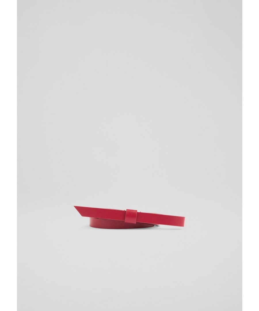 A chic belt that makes a great finishing touch to spring looks, Avery is a new style this season. Crafted in Italy from red dahlia nappa leather, it's a skinny style with half bow detail to the front and a press stud fastening. Wear it over your favourite dresses to accentuate the waist. 
