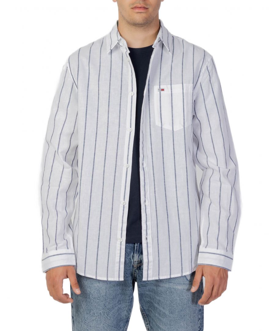 Brand: Tommy Hilfiger Jeans Gender: Men Type: Shirts Season: Spring/Summer  PRODUCT DETAIL • Color: blue • Pattern: striped • Fastening: buttons • Sleeves: long • Collar: classic  COMPOSITION AND MATERIAL • Composition: -58% Organic Cotton -42% linen  •  Washing: machine wash at 30°