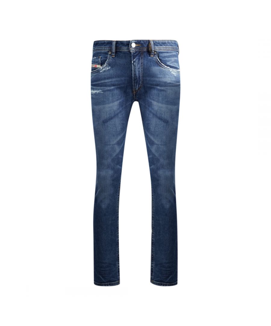 Diesel Thommer-X 009DE Jeans. Diesel Thommer 009DE Jeans. Zip Fly With Button Fasten, Destroyed Reinforced Denim. 98% Cotton 2% Elastane Stretch Denim. Diesel Branded Badge and 5th Coin Pocket. Style: THOMMER-X 00SB6C-009DE-01