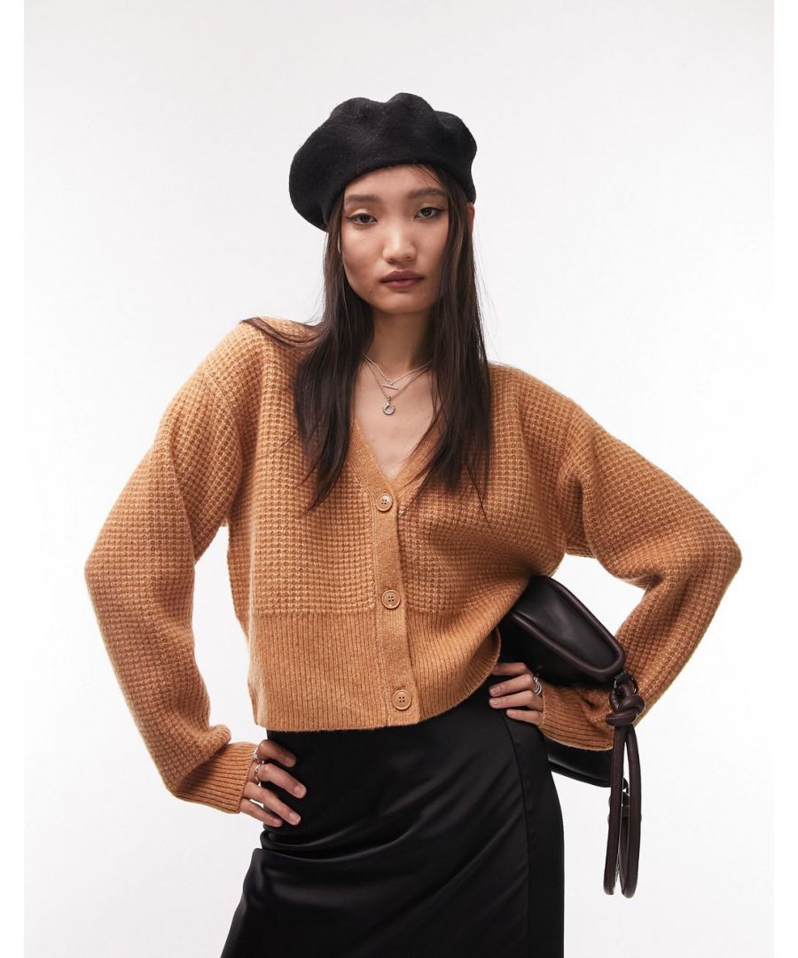 Jumpers & Cardigans by Topshop Welcome to the next phase of Topshop V-neck Button placket Ribbed trims Relaxed fit  Sold By: Asos