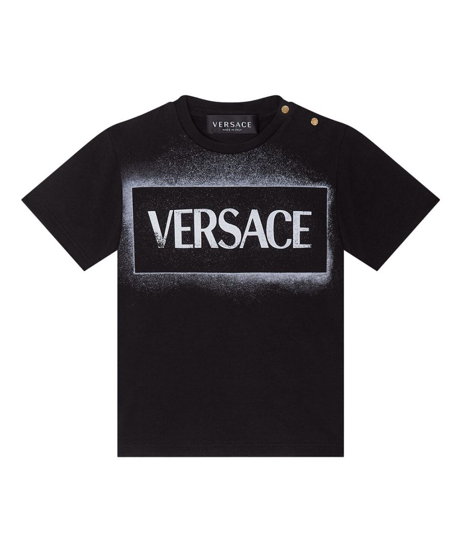 This Versace soft cotton black t-shirt consists of signature logo branding on chest with spray paint effect. \n\n\nLogo\nShort sleeves\nCrew neck\nGreca shoulder buttons\nOuter fabric: 100% Cotton\nCool iron on reverse with damp cloth on top\nDo not bleach\nDo not dry clean\nDo not tumble dry\nDry flat\nHand wash gently using mild detergent\nWash inside out