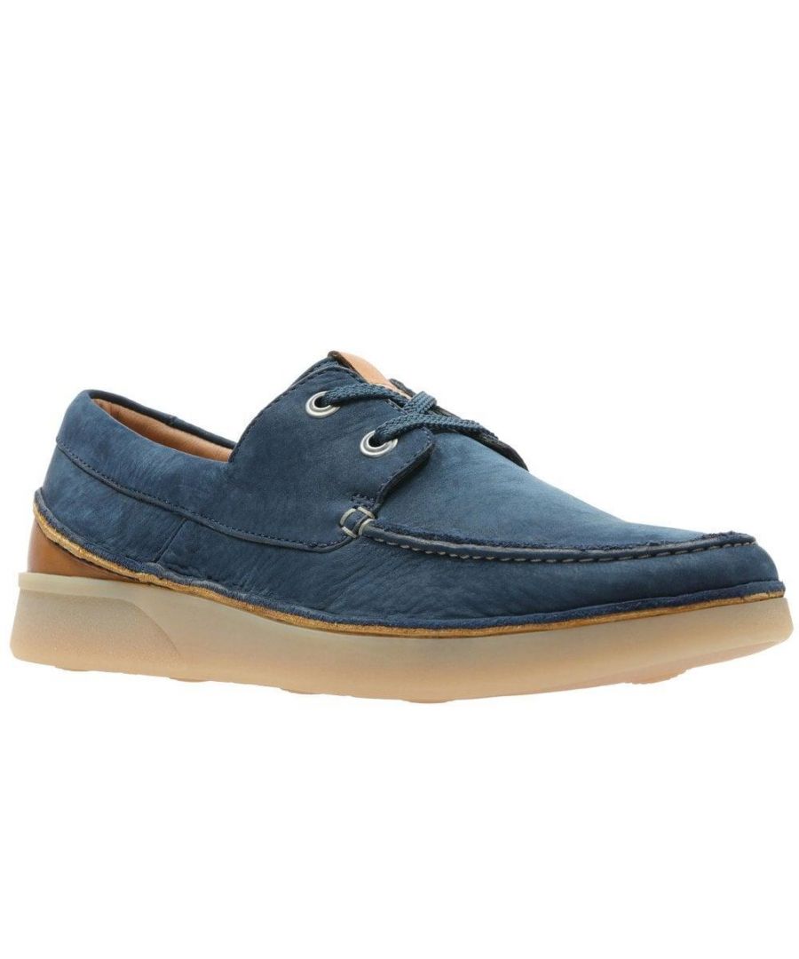 Clarks Men's Oakland Sun Navy Nubuck G\n\nWith a relaxed casual appeal, these slip-on shoes crafted from a premium nubuck with lace detailing feature authentic stitching for a crafted look and feel.\n\nThe contrasting rubber sole features our Active Air technology which uses pods along the gait cycle to encourage natural air flow as you walk.\n\nFinished with a super soft suede lining and sock for the best comfort underfoot.  Men’s Casual Shoes Men’s Shoes Men’s Boat Shoes \n\nFeatures:\n\nUpper: Genuine leather - Full grain leather, Nubuck\n\nSole: High-quality material\n\nTechnologies: Active Air\n\nInsole: Leather\n\nLining: Leather, Textile\n\nFitting: G