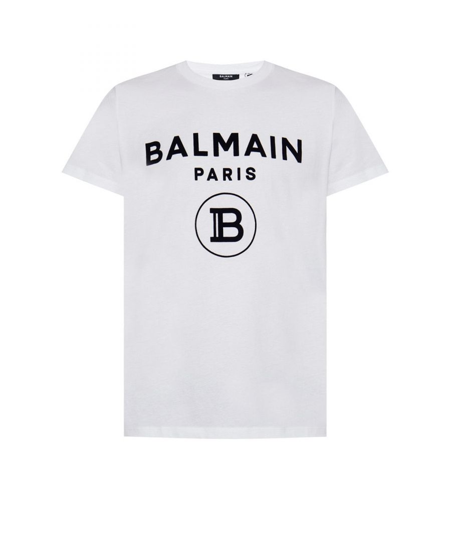 White T-shirt from Balmain. Made of 100% cotton. Decorated with a black logo. Round neck.\n\n\n\n\n 