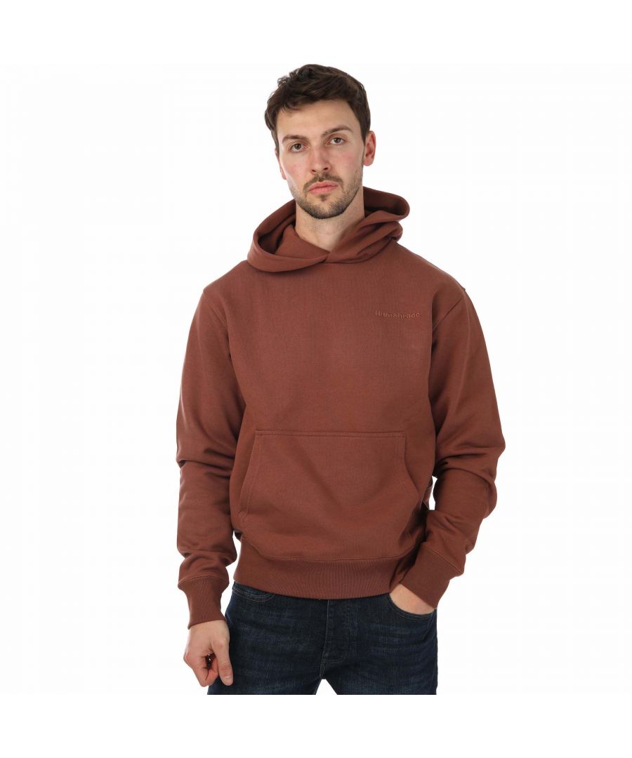 adidas Originals Pharrell Williams Basics Hoody in brown.- Fixed hood.- Kangaroo pocket.- Ribbed cuffs and hem.- Embroidered logo.- Relaxed fit.- 100% Cotton.- Ref: H58292