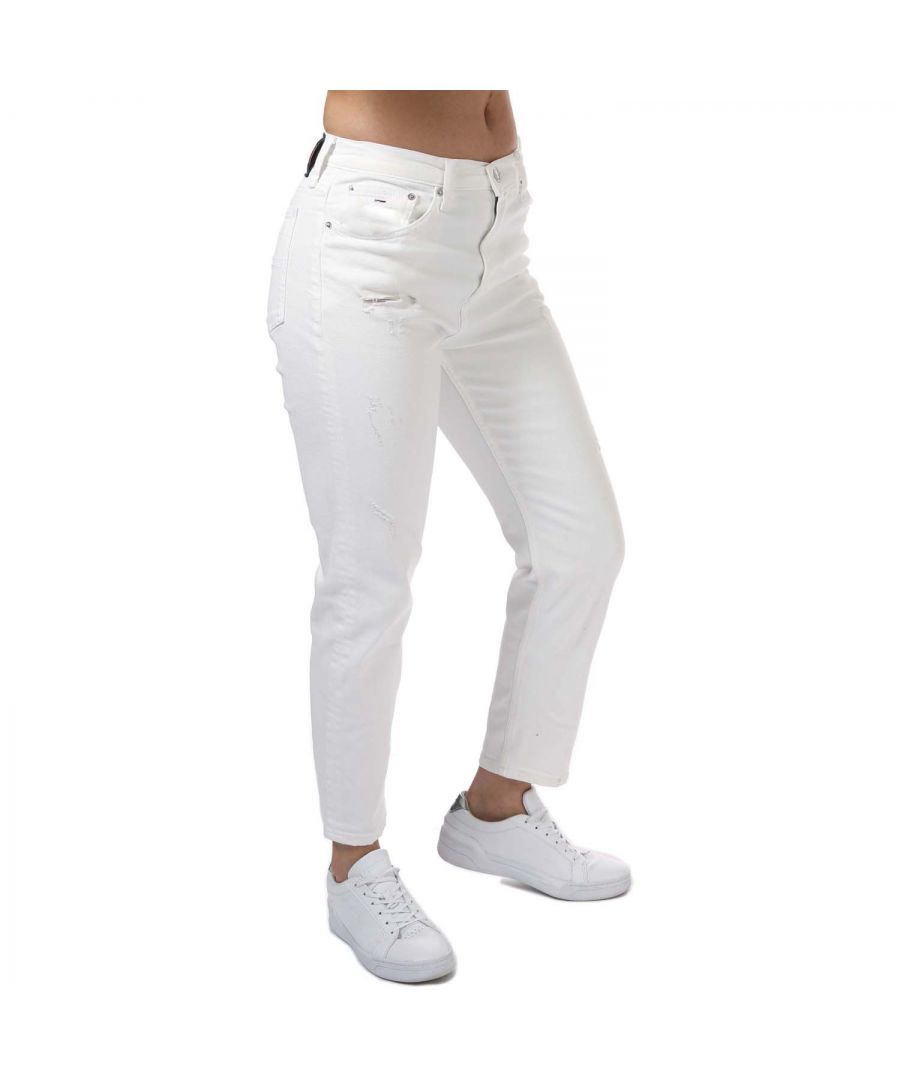 Womens Tommy Hilfiger Tabard Logo Patch Jeans in white.- Classic 5 pocket styling.- Zip fly and button fastening.- Tommy Jeans branding.- Tommy Jeans flag patch on front and back.- Ultra high rise waist.- Fading on seams.- Stretch cotton denim.- Tapered fit.- 90% Cotton  8% Polyester  2% Elastane. Machine wash at 30 degrees.- Ref: DW0DW098771CE
