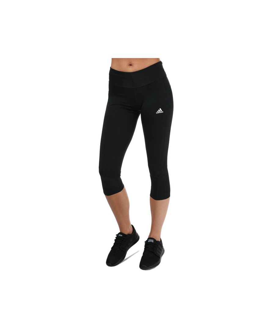 Womens adidas Own The Run ¾ Leggings in black.- Drawcord on elastic waist.- Phone pocket.- Cropped.- Moisture-absorbing AEROREADY.- Reflective details.- Pre-shaped knees.- Fitted fit.- Main Material: 55% Polyester (Recycled)  28% Polyester  17% Elastane. Machine washable. - Ref: FS9833