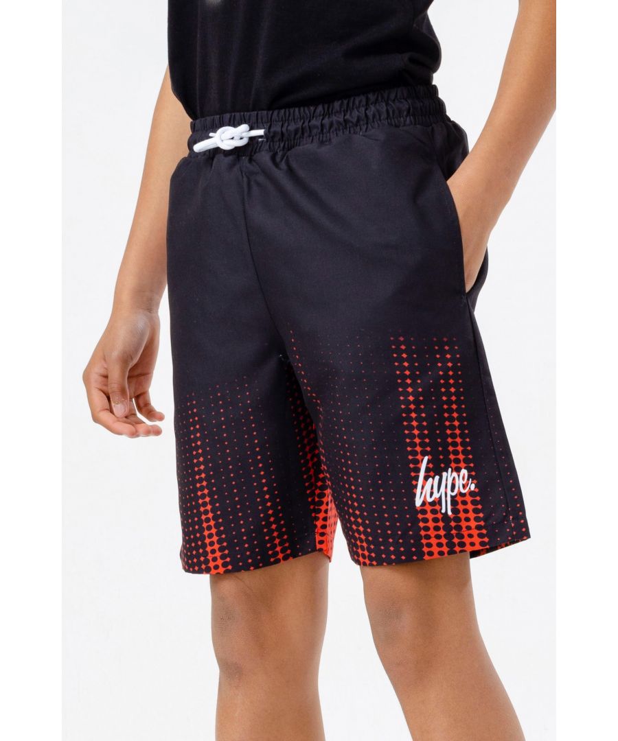 Meet your new Summer wardrobe staple, the HYPE. Boys Red Dot Swim Shorts, perfect for those beach or poolside days. Designed in a 100% Polyester fabric base for the ultimate comfort, featuring an elasticated waistband, drawstring pullers, and an all-over red dot fade print. Finished with the HYPE. mini script logo in contrasting white. Wear with a pair of HYPE. sliders and sunglasses to complete the look. Machine wash at 30 degrees.