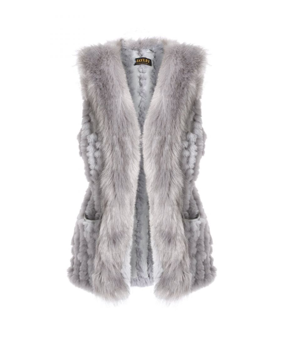 This hand knitted faux fur gilet is ideal to wear everyday. Its one size and casual pockets make it easy to wear, but add a luxurious finishing touch to any outfit.