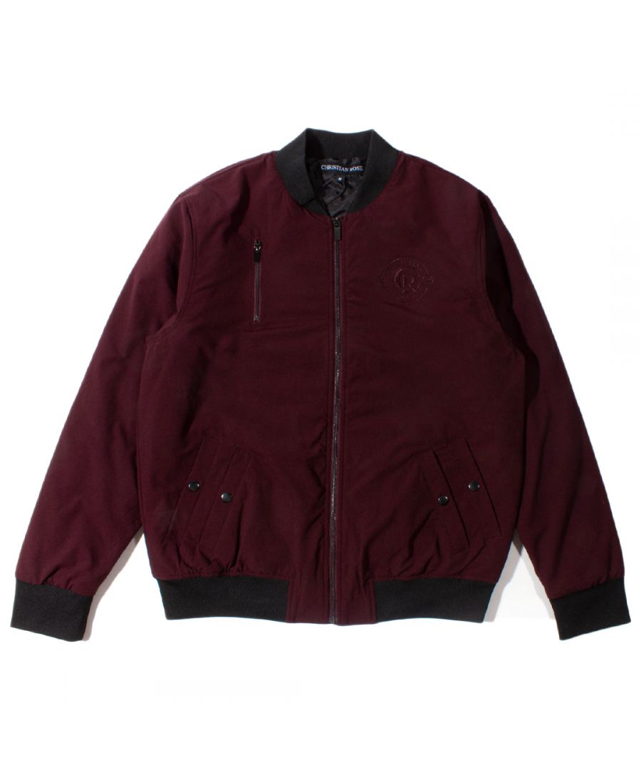 This Plum and Black bomber jacket by Christian Rose features the brand design embroidered on to the front left chest of the jacket. Popper button closure pockets on the front and also a classic bomber style zipper pocket on the chest