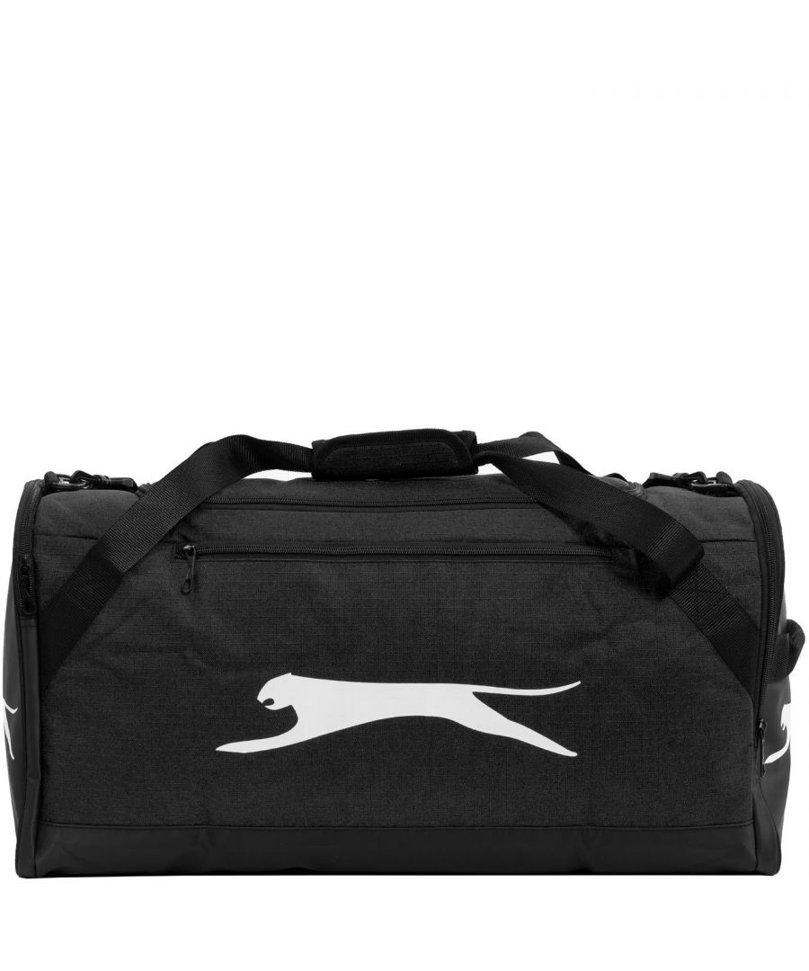 Slazenger Medium Holdall - This Slazenger Medium Holdall is ideal for taking to the gym or on a weekend away. It has a large main zipped compartment accessed at the top, a zip pocket to the front plus two further zip pockets to the sides for additional storage. There is an adjustable padded shoulder strap for carrying, which can be removed, a soft grip handle and smaller handles to the sides. Familiar Slazenger branding completes the look of this bag. This product may have slight cosmetic differences from the image shown due to assorted colours or updated seasonal collections. > Holdall > Main zipped compartment > 3 zip pockets > Removable, adjustable, padded shoulder strap > Soft carry handle > 2 side carry handles > Slazenger branding > L54cm x W26cm x D26cm > Wipe clean with a damp cloth