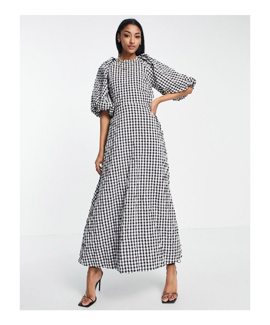 Tall dress by ASOS DESIGN Love at first scroll Gingham print Crew neck Puff sleeves Tie-keyhole back Relaxed fit  Sold By: Asos