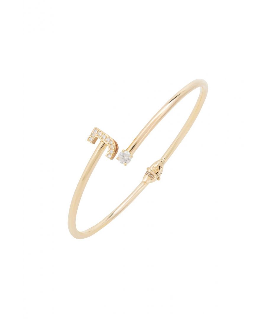 Design:This simple but beautifully styled initial bangle bracelet is perfect for those who covet delicate jewellery with a hint of sparkle, offering a sophisticated finishing touch to any outfit.Pretty and petite, this initial open cuff bangle features a hinge on the underside which makes it easy to put on and take off. The opening is designed to be on top of the wrist, where a zircon adorned monogram sits on one side and a single larger cubic zirconia resides on the other.What can be more personal than a name? Give this initial bangle bracelet as the perfect personalised birthday gift. Materials:Handcrafted using 925 sterling silver, dipped in 22ct gold. White cubic zirconia.Style Notes:Perfect pairing to the initial ring.Personalised birthday gift ideas. Bridesmaid gifts. Simple everyday styling.Dimensions:Bracelet: 19.5cm Packaging:This item is presented in a Latelita London signature jewellery box.Care Instructions:To maintain your jewellery, wipe gently with a damp cloth that is soft and clean. Do not soak in water. Avoid contact with soaps, detergents, perfume or hair spray.