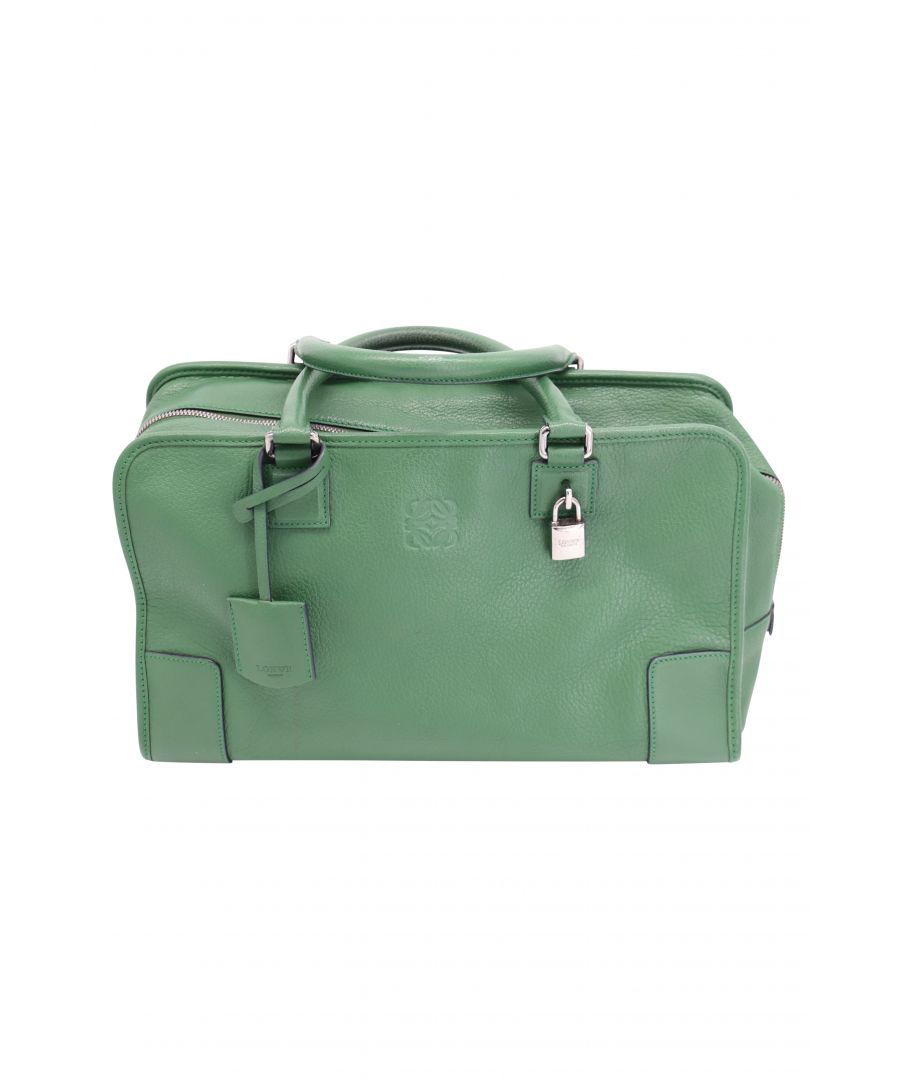 VINTAGE, RRP AS NEW\nThe Amazona 36 satchel by Loewe features silver-tone hardware, debossed logo on the front, dual-rolled leather handles, and a top zipper closure. Crafted from quality leather and designed in a lovely shade of green, this satchel will surely make your outfit!\n\nLoewe Amazona 36 Satchel in Green Leather\nCondition: very good, with minimal white marks on bottom of bag, with marks on bag lining\nSign of wear: yes\nSKU: 102356   \nSize: one size\nColor: green\nMaterial: leather