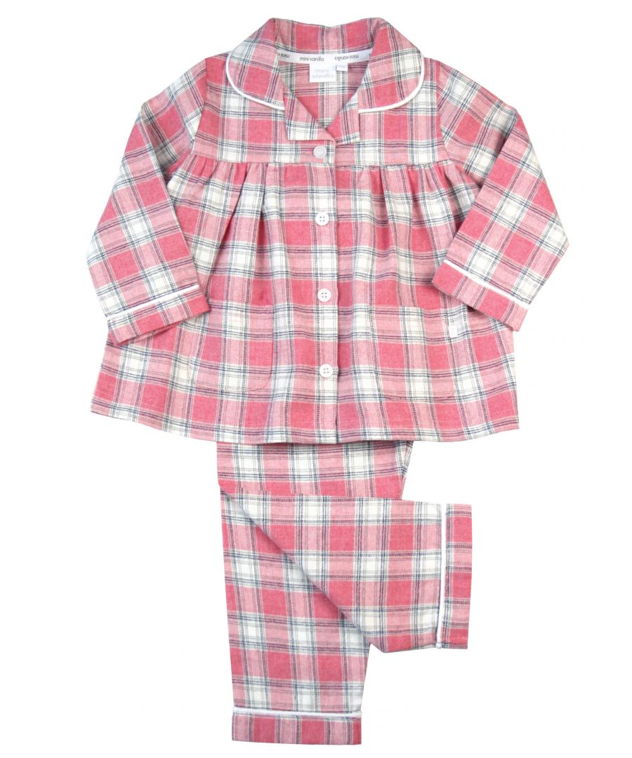Pretty in Pink Girls Check Traditional Pyjamas\nOur pure-cotton pink check pyjamas are a beautiful-quality addition to their nightwear collection. Our cotton flannel is brushed, making it unbeatably soft and cosy against the skin and plush to the touch. The collar and pockets feature smart piped trims, and the matching pyjama bottoms have an easy pull-on waistband, which is fully elasticated for comfort.\nFeatures\nButton-down long-sleeved top\nClassic Pink Brushed Check\nNeat piping along collar and cuffs\nElasticated waistband\n100% Cotton\nMachine Washable\nSoft brushed cotton\nFront pockets\nEngraved pearl effect buttons