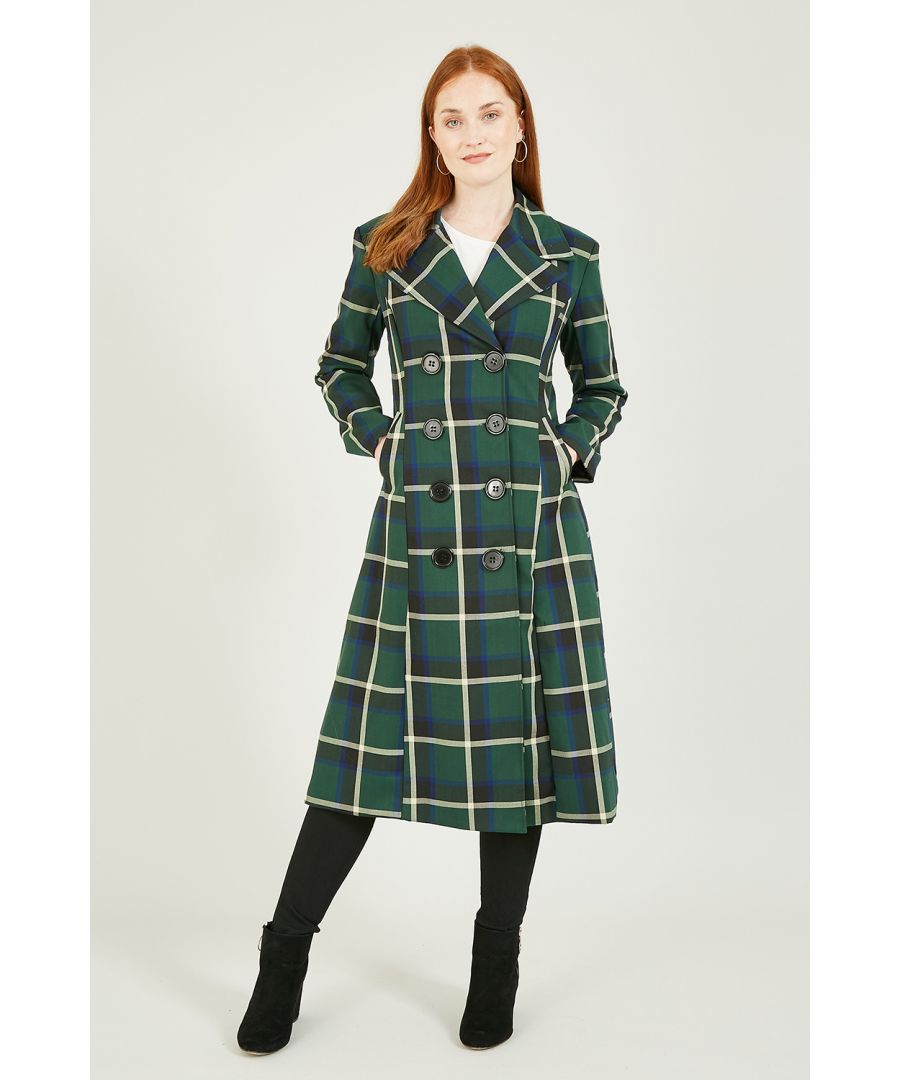 A timeless new season essential, this Yumi Green Checked Fitted Retro Dress Coat is a must-have item. Features a stunning retro inspired green check, double breasted large button fastenings, with a super flattering fitted waist and skirt/dress style finish. Think crunchy leaves, bonfires and pumpkins: perfection.