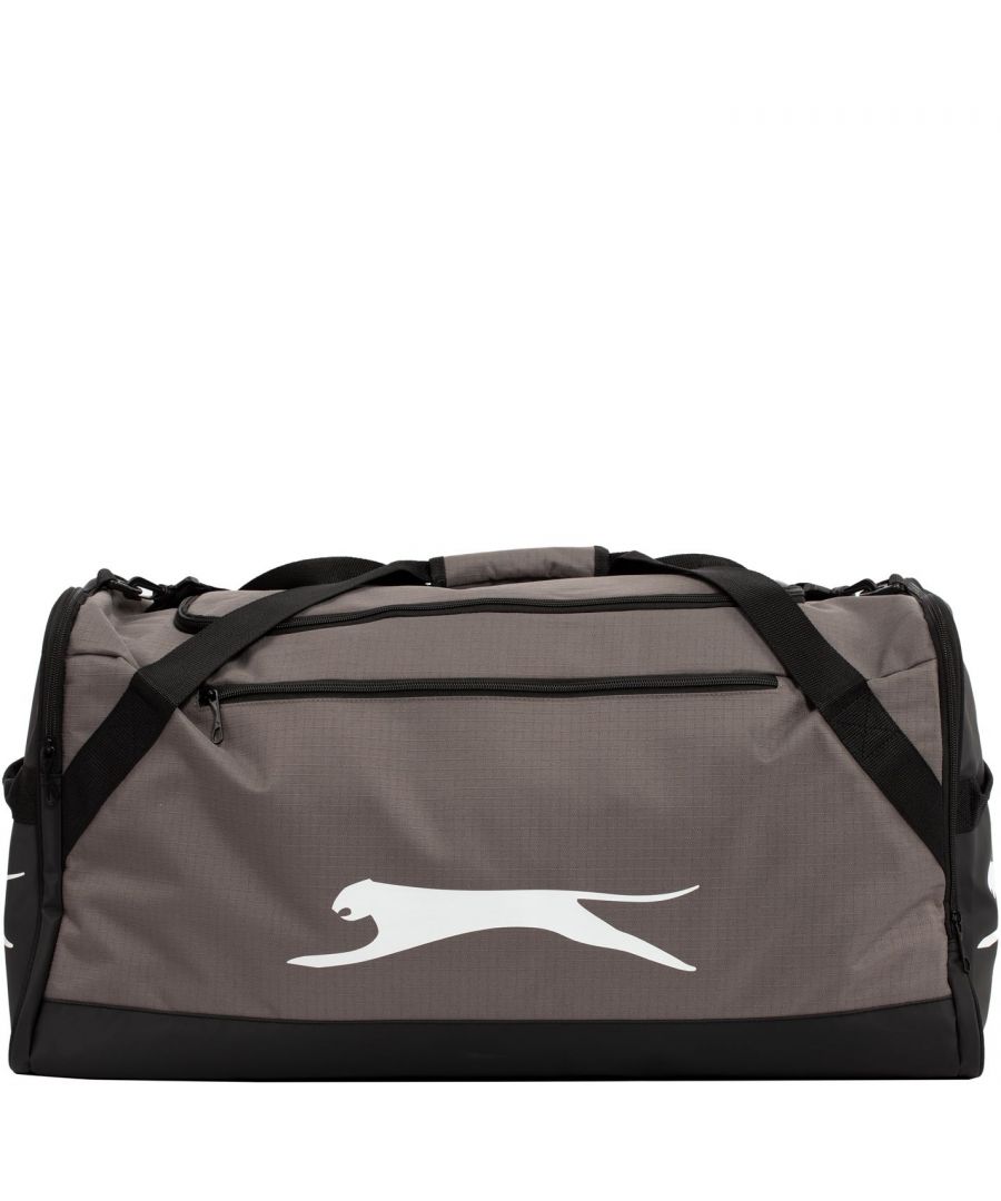 Slazenger Large Holdall - The Slazenger Large Holdall is perfect for transporting all of your sports equipment thanks to the large main compartment and pockets to the ends and front with zip fastening for security. This Holdall has an adjustable shoulder strap and two carry handles for easy transportation and is finished off with Slazenger branding for a sporty look. > Bag > Zip fastenings > Large compartment > Pocket on each end > Pocket to the front > Adjustable shoulder strap > Two carry handles > Slazenger branding > 75cm x 31.5cm x 35cm > Wipe clean with a damp cloth