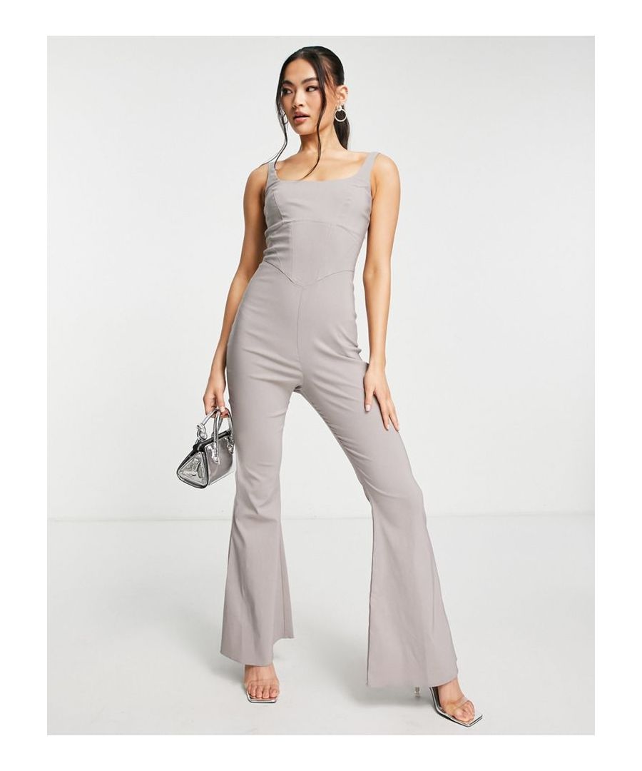 Jumpsuit by ASOS DESIGN No need for a dress to impress Square neck Fixed straps Corset-style waist Zip-back fastening Flared leg Slim fit  Sold By: Asos