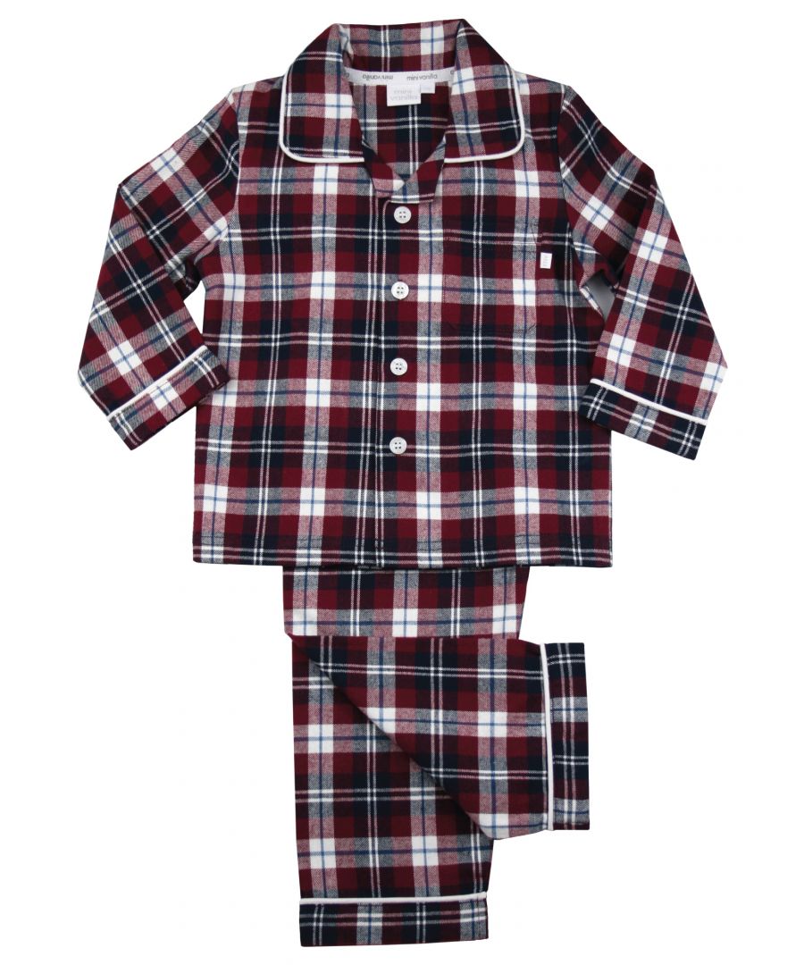 Boys Jordan Burgundy Check Traditional Pyjamas\n\nYour little boy will look SO grown up in these traditional check fabric Pyjamas. 100% brushed cotton which is soft and cosy against the skin. This PJ set has lots of extra details like engraved buttons and white piping on the collar and cuffs. Just like a grown up pair of Pyjamas only smaller! \nIt’s easy to create mini-me looks with our Jordan Check range as coordinating styles are also available in our adult collection.\nLittle known fact: the secret to a good night's sleep is a great pair of pyjamas. Our fan favourite classic two-piece PJ sets are made with 100% cotton and they're full of classic details and checks. Your little one will want to wear these awesome pyjama set all day long!\nSold as a Pyjama set.\nFabric: 100% cotton - Warm brushed cotton\nFire Warning : KEEP AWAY FROM FIRE AND FLAMES.\nWash Care Instructions : Machine wash inside out, do not soak, wash dark colours separately, do not iron trims. Save energy and wash at 30 degrees.\nDo not tumble dry