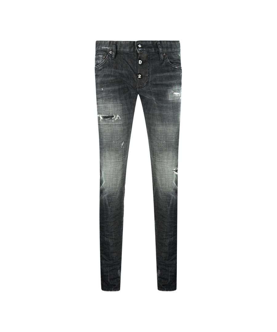 Dsquared2 Slim Jean 1964 versleten zwarte jeans. D2 Slim Jean S74LB0784 S30357 900. Stretchdenim 98% katoen, 2% elastaan. Knoopsluiting, zichtbare knopen met merklogo Slanke pasvorm. Badge met merklogo en versterkte versleten denim
