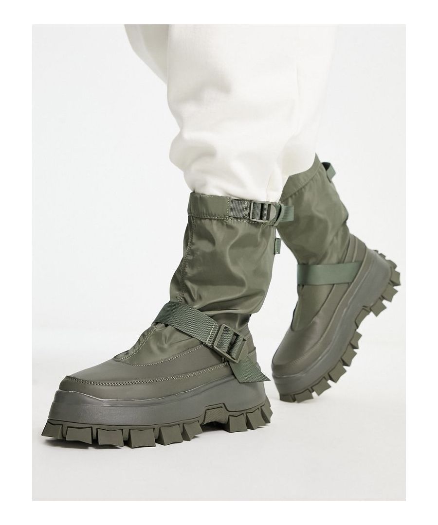 Boots by ASOS DESIGN Next stop: checkout Pull-on style Adjustable straps Round toe Chunky sole Lugged tread Sold by Asos