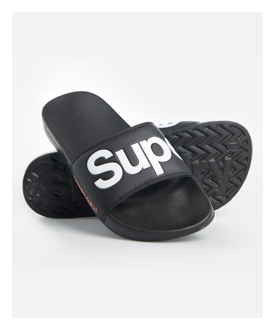 Superdry men's pool sliders. The perfect pool side slip on, these sliders feature a wide strap and moulded sole for comfort. The sliders are completed with a Superdry logo on the side of the sole and on the front of the strap.S - UK 6-7, EU 40-41, US 7-8M - UK 8-9, EU 42-43, US 9-10L - UK 10-11, EU 44-45, US 11-12XL - UK 12-13, EU 46-47, US 13-14