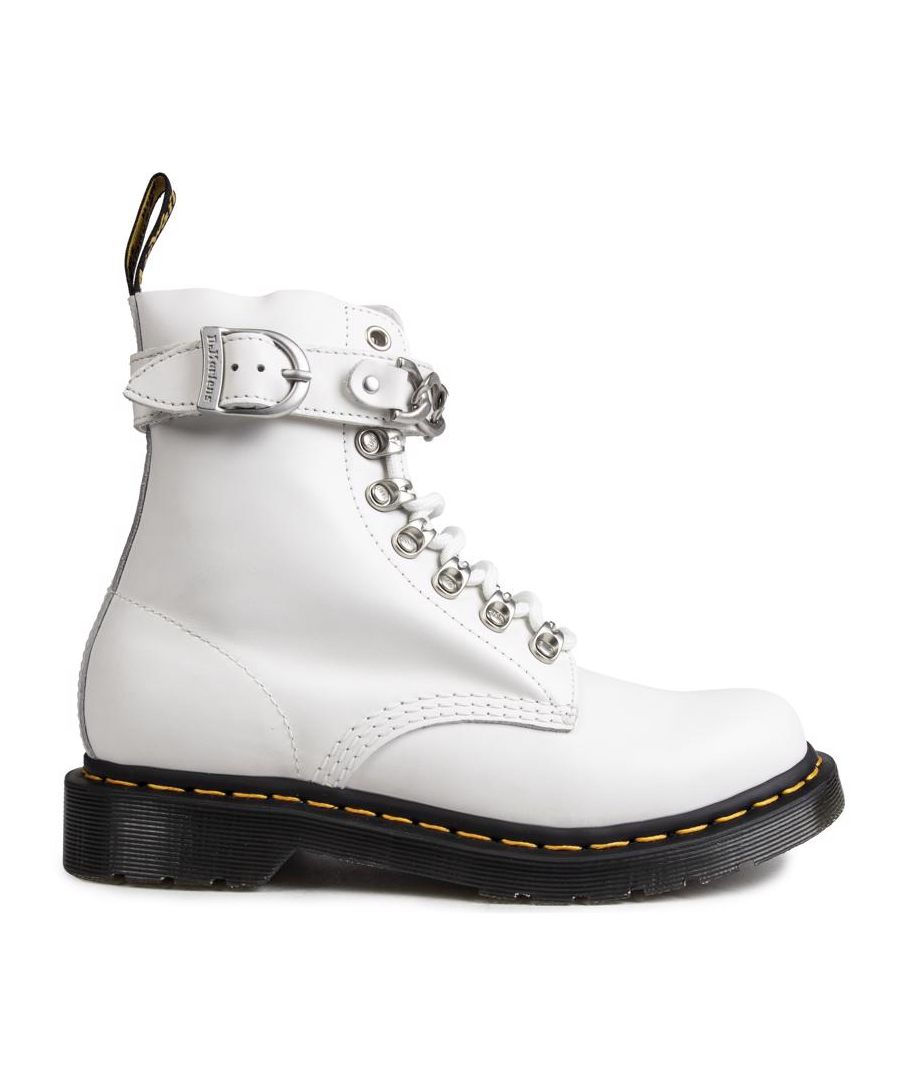Women's White Dr. Martens 1460 Pascal Lace-up Boots With A Leather Upper Featuring Standout Hiking Style Metal Studs And Loops Lacing System And Signature Airwair Heel Loop. These Ladies' High-top Boots Have A Striking Silver Hardware Buckle And Chain Detail, The Iconic Doc's Yellow Stitching And Goodyear Welted Air-cushioned Sole With Rugged Tread.