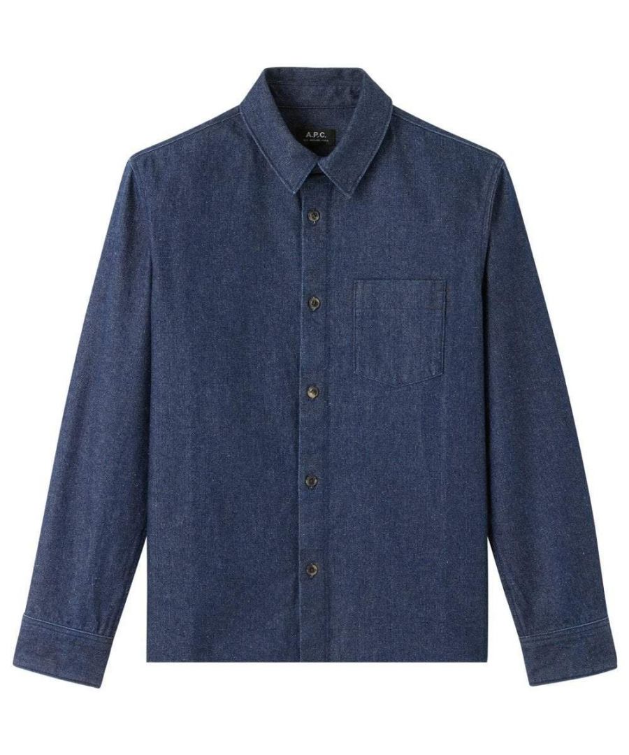 This blue Denim Shirt from A.P.C is crafted from cotton and features a wide cut, button placket, six buttons in faux horn, a breast pocket, back yoke, pleat and reinforced slit and wrist and a rounded topstitched cuffs with bottom closure.\nThin denim. 100% Cotton. Wide cut. Buttoned placket. Six buttons in faux horn. Breast pocket. Back yoke. Long sleeves. Pleat and reinforced slit at wrist. Rounded, topstitched cuffs with button closure. Rounded hem. Small side slit.