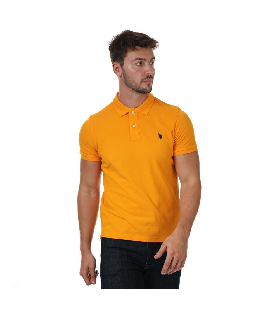 Mens US Polo Assn Pique Polo Shirt in orange.- Button down collar.- Short sleeves.- Two button placket.- Featuring the embroidered double horsemen for the USPA stamp of authenticity.- Ribbed cuffs.- 100% Cotton. - Ref: 63515216