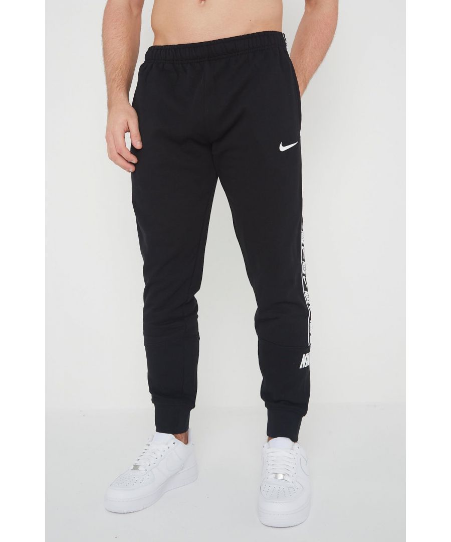 Nike Sportswear Repeat Fleece Joggers.   \nInseam Length 28 Inches.     \nStandard Fit for a Relaxed, Easy Feel.     \nKeeps You Comfy in Brushed Fleece Fabric with Tapered Legs and Ribbed Cuffs.    \nElastic Waistband and Hand Pockets Help Ensure Reliable Fit and Coverage.    \nSingle Secure Back Pocket Provides Storage for Essentials.