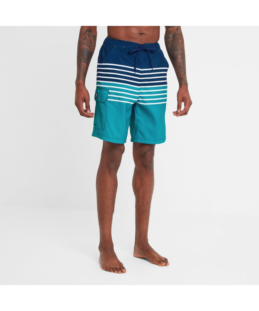 Supersoft and sustainable, our eco-friendly Justin board shorts are made from 100% recycled polyester fabric. The fabric is water repellent so they dry quickly and the inner mesh lining is supersoft so you'll always be comfortable whether you're swimming or walking. Justin has an elasticated waistband, with decorative drawcords, that feels comfortable when you're having a dip in the pool, sunbathing on the beach or walking along the seafront with your mates. It has two angled pockets at the hips, one pocket on the back and a patch pocket on the side so you always have somewhere to keep your essentials when you're not getting wet. The shorts are designed with horizontal stripes across the middle, and the seaside colours are inspired by our trips to the Yorkshire seafront. Justin is finished off with a small embroidered TOG24 badge on the pocket flap, with the rose representing our motto 
