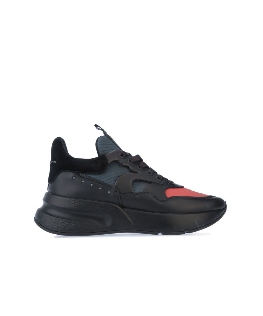 Mens Alexander McQueen Oversized Runner Trainers in black. – Leather upper. – Lace up fastening. – Almond toe. – Tongue with a bold Alexander McQueen signature. – Branded insole  branded heel counter. – Padded insole. – Rubber sole. – Leather upper  Leather lining  Synthetic sole. – Ref: 627196WHXIL