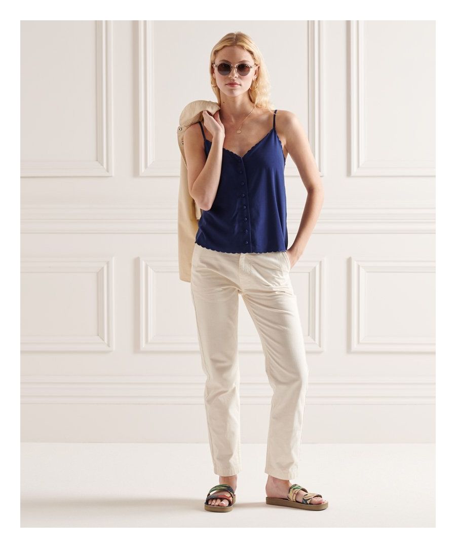 If you're looking for a lightweight top for the summer, the Cami Top may be the one for you. It's delicate, sleek, sophisticated, and can be styled with anything from skirts to trousers.Scalloped edgeButton fasteningAdjustable spaghetti straps