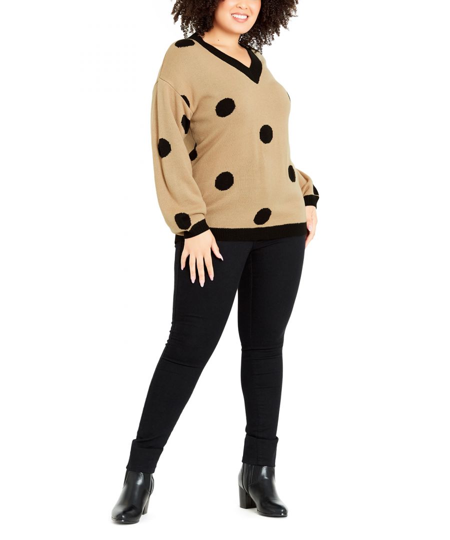 Rug up in the soft, free-spirited style of the Spot Jumper. This polka dot design adds a whimsical touch to an everyday knit with a classic V-neckline and relaxed fit. Key Features Include: - V-neckline - Long sleeve - Pull on style - Ribbed knit fabrication - Relaxed fit - Hip length hemline