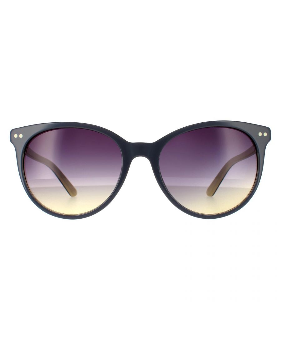 Calvin Klein Round  Womens Slate Yellow Purple Gradient Sunglasses CK18509S are a lightweight large round frame with vintage detailing, including  corner flicks with metal rivet details. Temples feature the Calvin Klein logo for brand authenticity