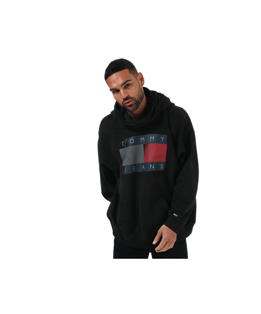 Mens Tommy Hilfiger Reflective Logo Funnel Neck Hoody in black.- Hooded funnel neck.- Dropped shoulders.- Rib-knit cuffs and hem.- Kangaroo style pocket to front.- Tommy Jeans reflective logo on front.- Tommy Jeans branding.- Pure cotton terry.- 98% Cotton  2% Elastane. Machine wash at 30 degrees.- Ref: DM0DM11649BDS