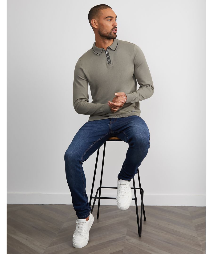 This cotton rich, fine knit jumper from Threadbare features a polo collar with zip fastening and tipping detail. Team with a pair of jeans or casual trousers to complete the smart casual look. Other colours available.