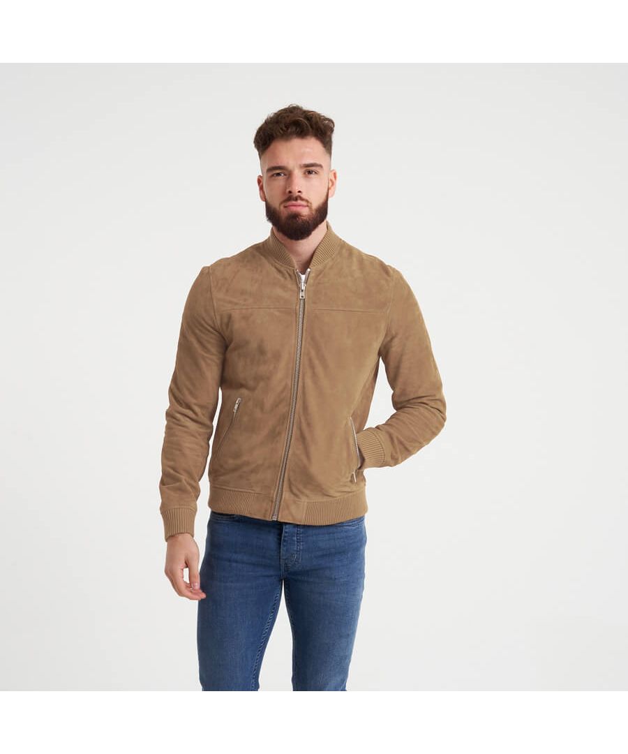Super soft and super suave, this goat suede bomber jacket from Barneys Originals is an all-year round style staple. With ribbed cuffs, neckline and an elasticated ribbed waistline, this jacket was made for comfort. Style it along side casual or formal attire for an effortless fashion win.