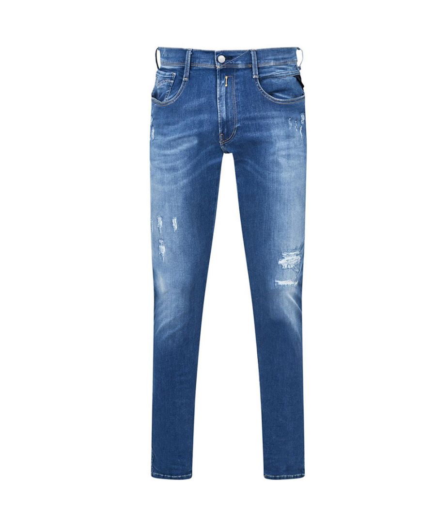 These Replay Mens Hyperflex Jeans in Blue are crafted in a soft cotton/polyester mix material and have a slim fit. They feature a zip fly with button fastening, belt loops and a classic five pocket design.\n\nDistressed detailing\nZip fly with button fastening\nFive pocket design
