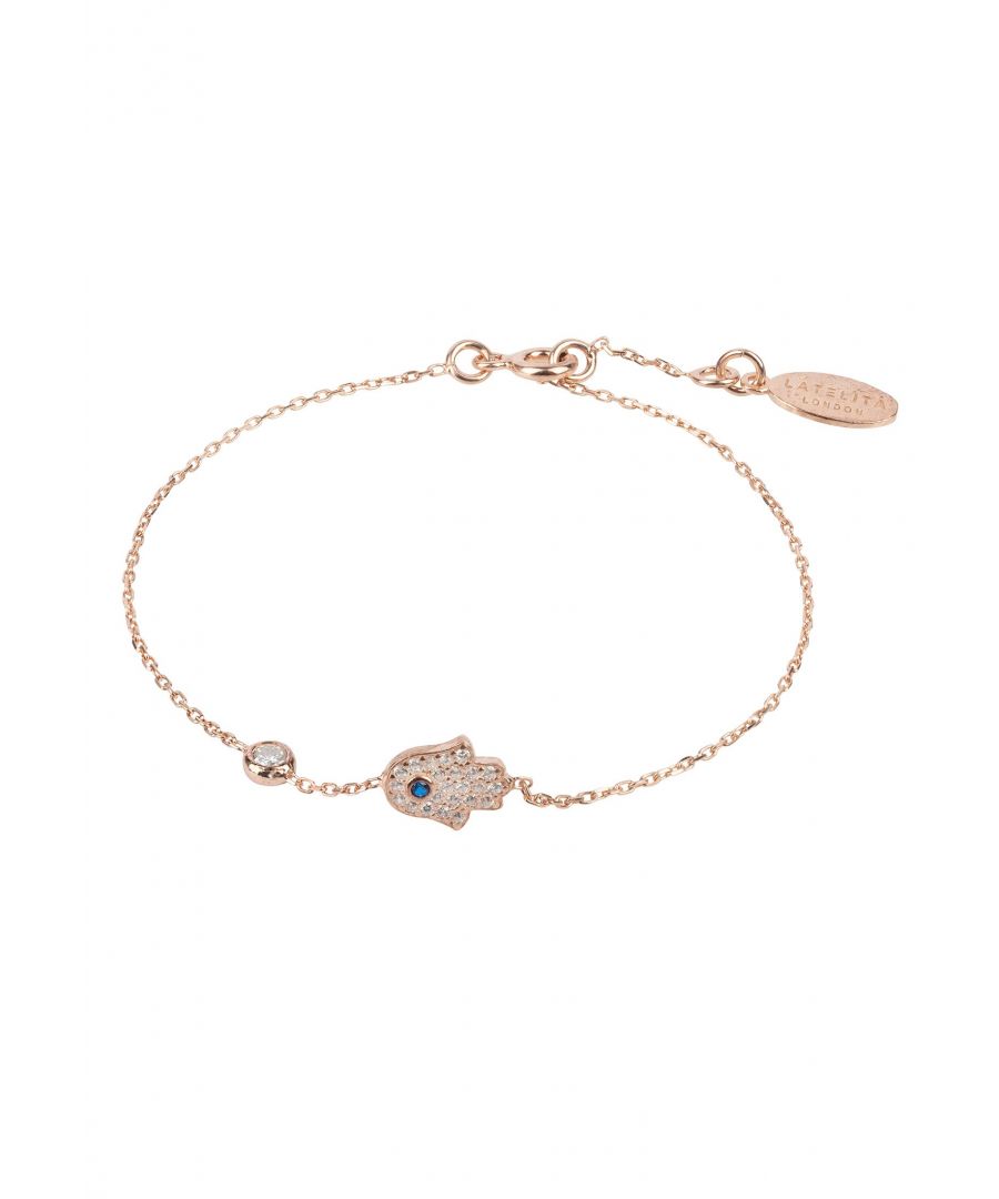 Looking for a chic and stylish bracelet that you can wear every day? Look no further than the Hamsa Hand Bracelet!\nThis beautiful bracelet is handcrafted from 925 sterling silver dipped in either 22ct gold, rosegold or rhodium, and adorned with Latelita London's dazzling white zircons. It's the perfect piece to add a touch of sparkle to your look, day or night.\nThe bracelet length is 14.5-15cm with the hand motif 0.8cm and weight 1.5g, and is finished with a lobster clasp and size adjuster, making it easy to find the perfect fit.\nPlus, it makes a great layering piece or can be worn on its own for a more minimalistic look. Pair with the matching Hamsa/Hamza necklace for a coordinated look.\nThe hamza hand is an ancient amulet that has been used for centuries to ward off negative energy (evil eye). The hamsa hand is a symbol of good luck and protection. This necklace is a beautiful and fashionable way to keep that tradition alive.\nWhether you're dressing up for a special occasion or just want to add some pizzazz to your everyday style, or you're looking for a special gift for someone special or treating yourself, the Hamsa Hand Bracelet is sure to make a lasting impression.\nSo go ahead and add it to your cart today!