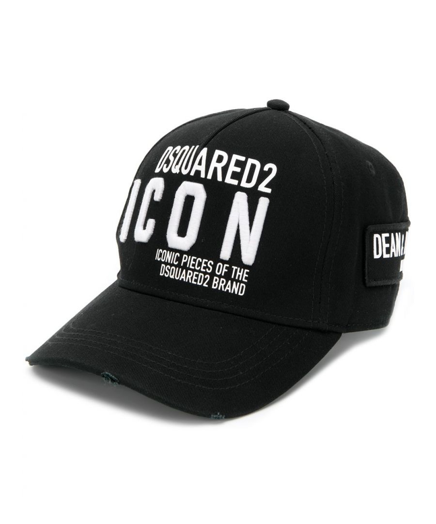 Be an icon in this black cotton Icon embroidered baseball cap from DSQUARED2. Designed with a distressed finish and a brand bio printed to the side, this laid-back accessory is the perfect piece to finish your look. Featuring a curved peak, a distressed finish, 'Icon' embroidery to the front, a brand patch to the side, an adjustable strap to the back, a printed brand bio to the side and an embroidered logo to the back.\nProduct code: BCM029005C00001