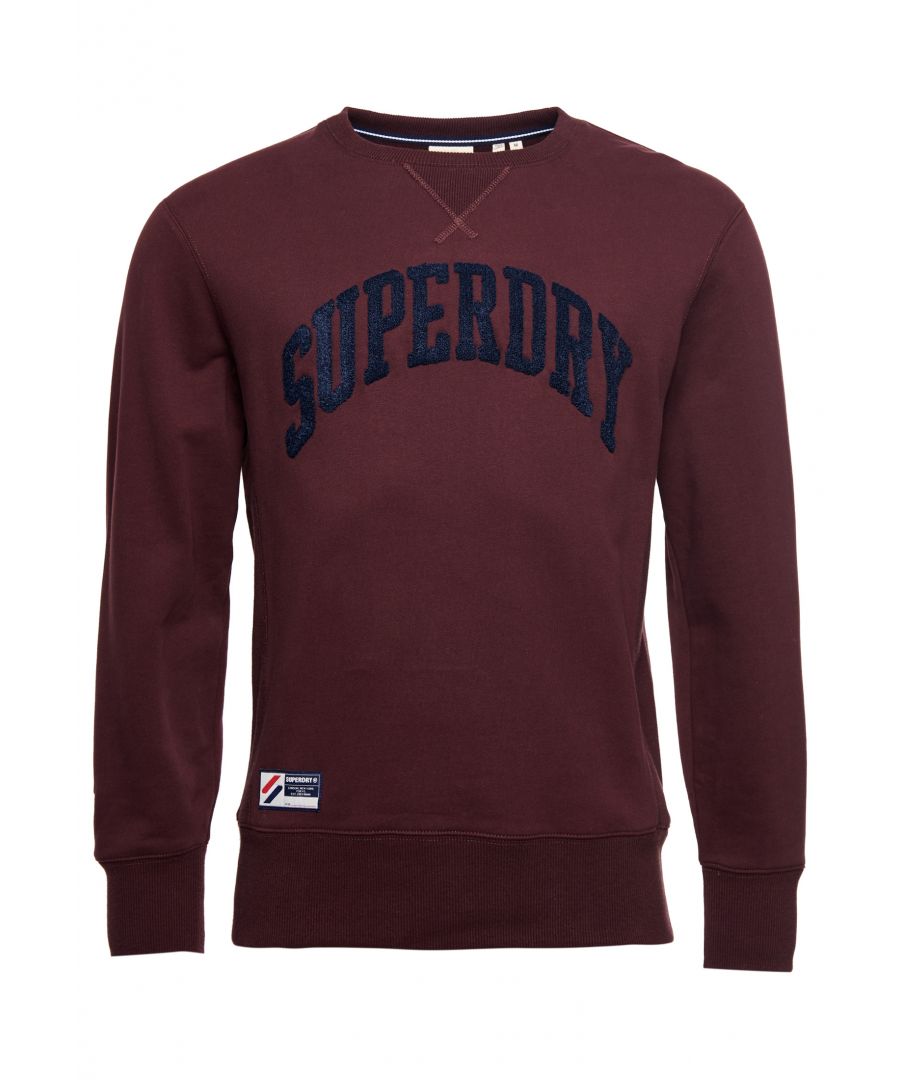 Get an athleisure-inspired look with the Varsity Arch Crew Sweatshirt, featuring an embroidered arch inspired graphic.Relaxed fit – the classic Superdry fit. Not too slim, not too loose, just right. Go for your normal sizeCrew necklineLong sleevesRibbed cuffs and hemEmbroidered graphicSignature logo patch