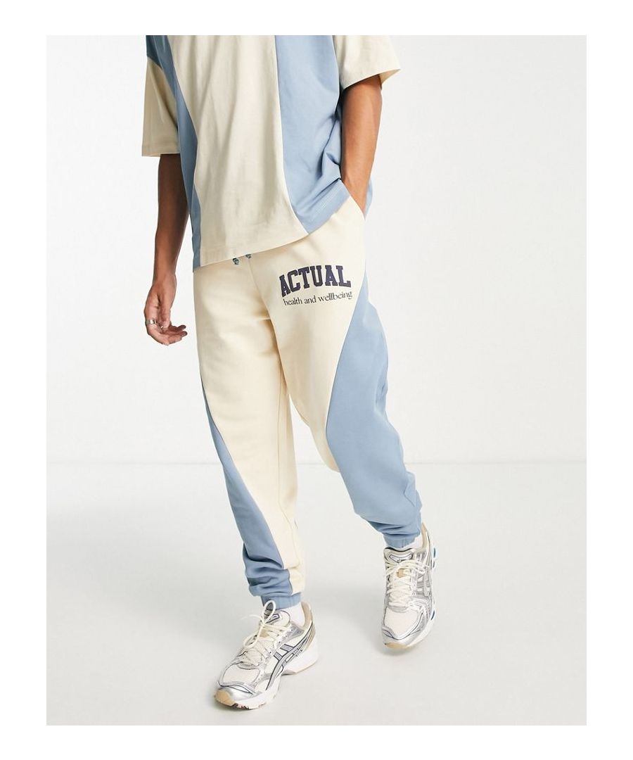 Joggers by ASOS DESIGN Part of a co-ord set T-shirt sold separately Elasticated drawstring waist Side pockets Elasticated cuffs Relaxed, tapered fit Sold by Asos