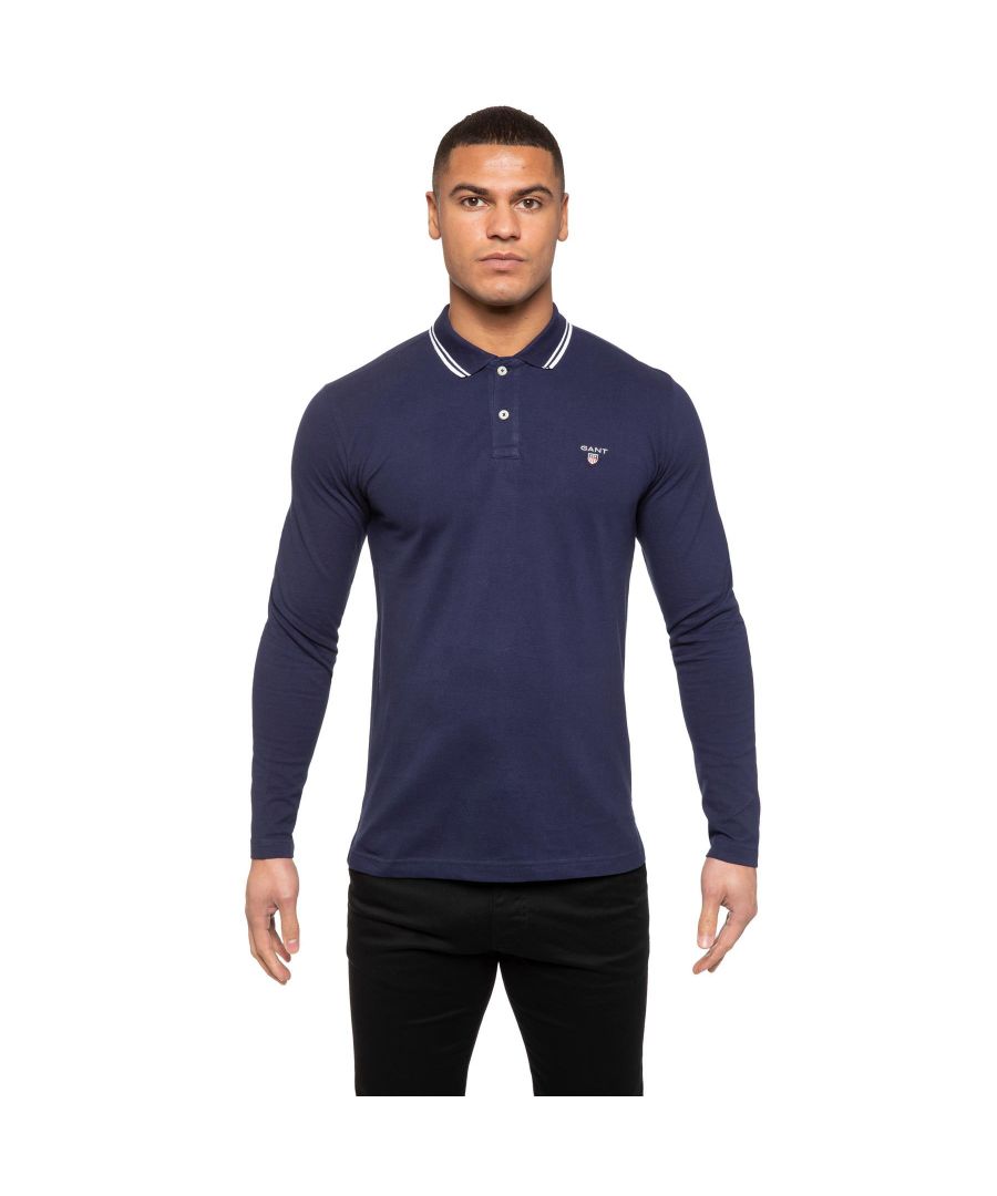 Gant Mens Designer Long Sleeve Polos feature the brands Logo, a Contrasting Trim and a Button-Down Collared Neckline. Crafted With 100% Cotton, these Lightweight and breathable Regular Fit Polos are Suitable for Casual or Workwear.