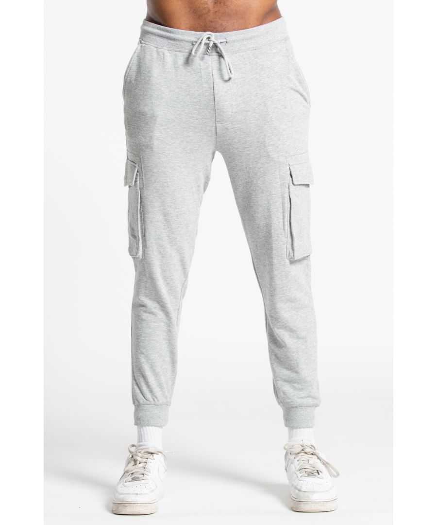 These fleece cargo joggers from Tokyo Laundry are a comfortable classic. Feature ribbed elasticated waistband and cuffs, two side pockets, two cargo style pockets and back pocket with Tokyo Laundry branding, and a drawstring. Made from cotton blend fabric to ensure high quality.