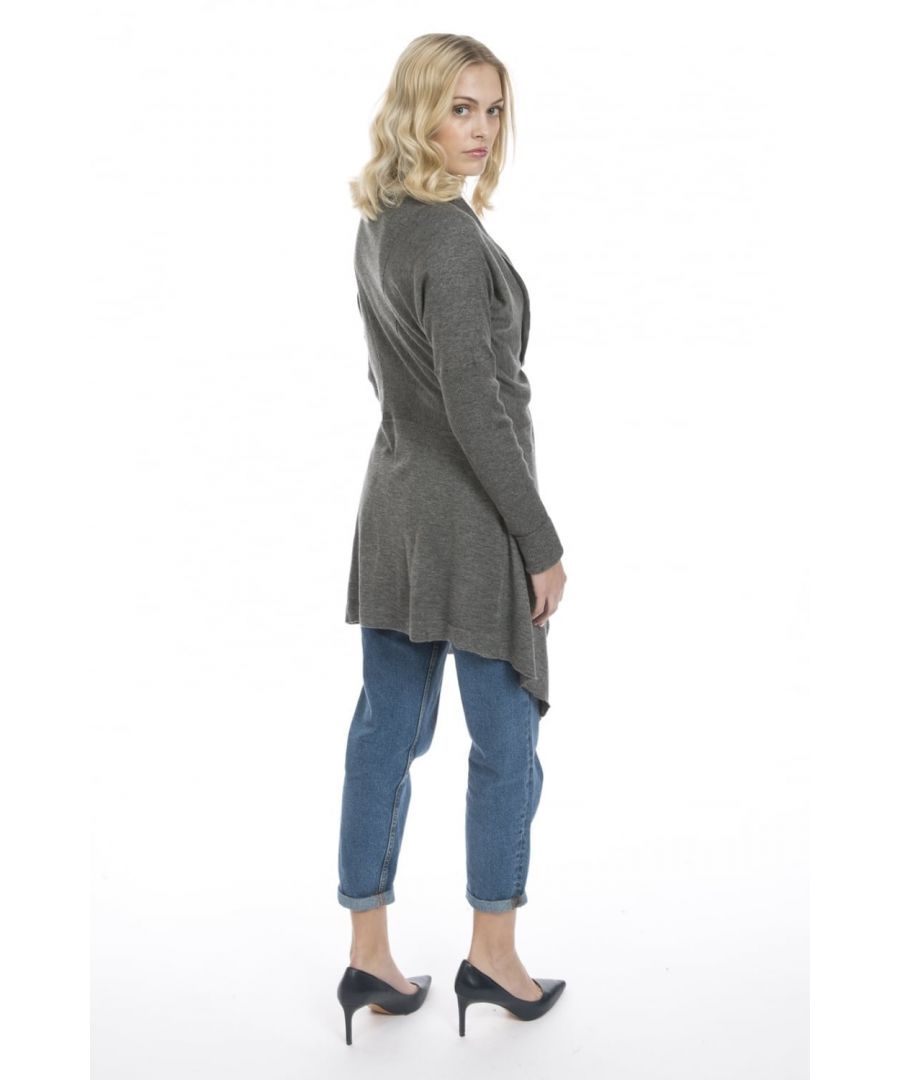 Size\nModel Height: 5'8\n\nModel Size: 8\n\nModel Wearing: One Size\n\nAn exceptional cashmere cardigan with rolling lapels and flared side seams adding femininity to the silhouette of the item.\n\n100% Cashmere.