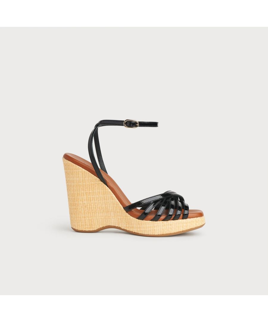 With a hint of Seventies' playfulness, our Solange wedges balance height and comfort. Crafted in Italy from black patent leather, they have a crossover multi-strap design, a delicate ankle strap and a beige raffia 110mm wedge sole. Perfect with summer's cool cotton and linen skirts and dresses, they're also great with wide leg trousers.