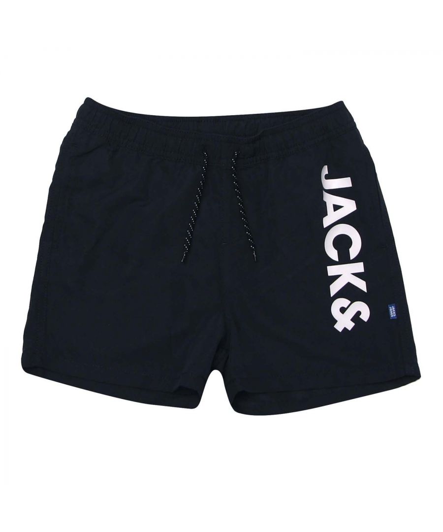 Junior Boys Jack Jones Aruba Swim Shorts in navy.-Elasticated drawcord waist.- Two slip pockets.- Mesh inner brief.- Printed branding.- Quick drying fabric.- Shell: 50% Polyester  50% (Recycled). Lining: 100% Polyester.- Ref: 12190191