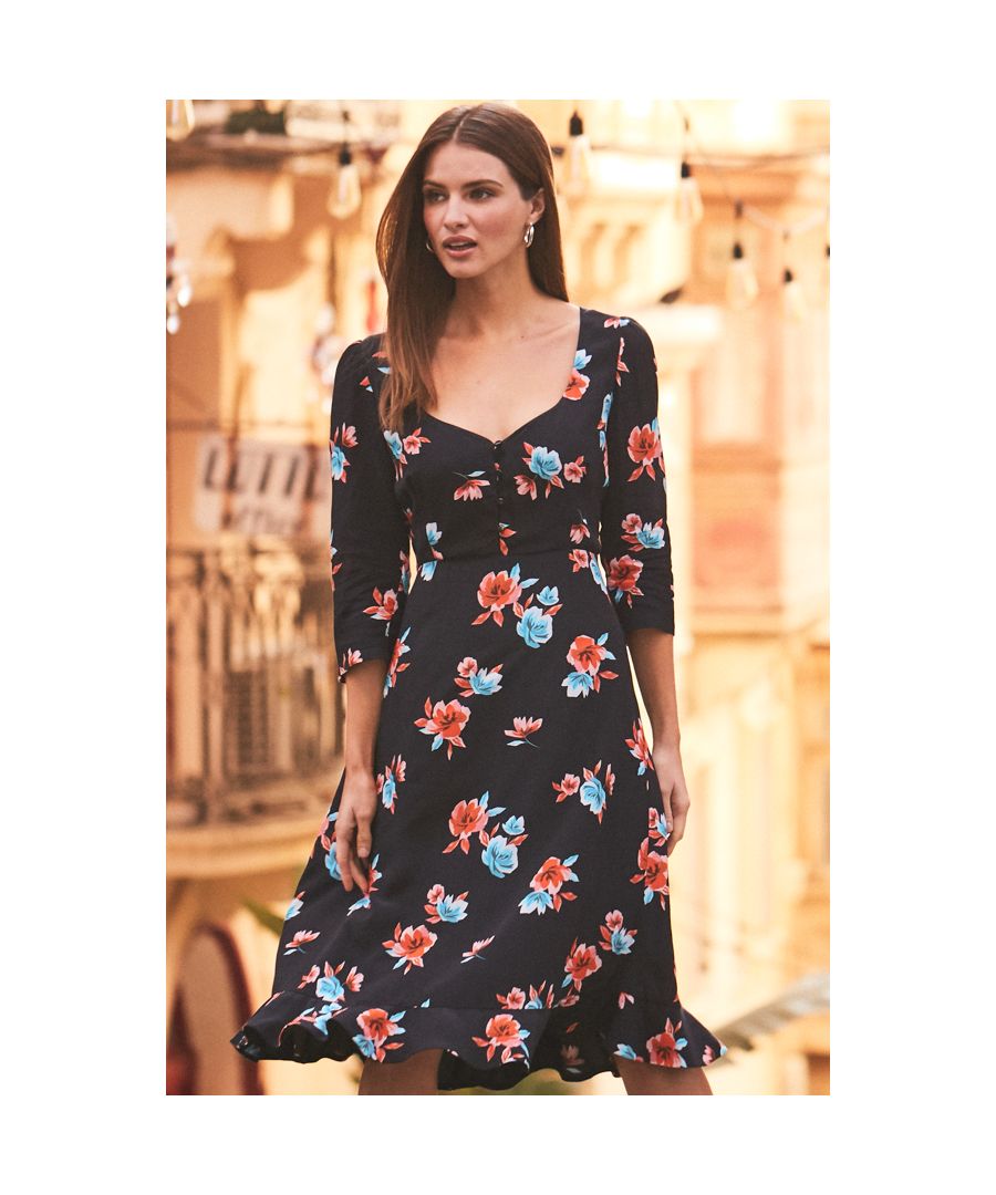 REASONS TO BUY: \n\nFlorals are always a good idea\nOn-trend sweetheart neckline\nSwishy ruffle hem\nFlattering elbow length sleeves\nYou'll wear it year-round\nStyle it with nude courts for a chic look