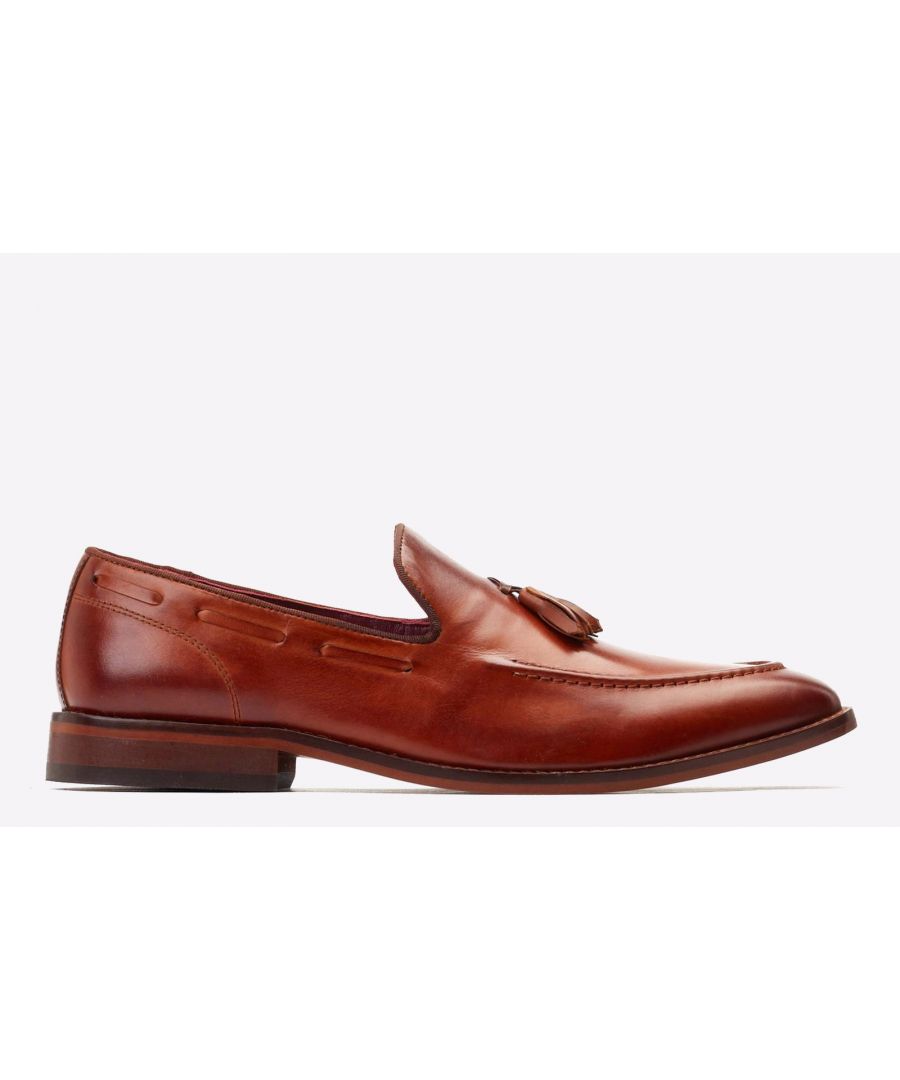 Crafted from quality leather and features intricate raised stitching and a leather tassel across the vamp. The cushioned inner sole and leather heel patch provide unbeatable comfort, making the Satire the perfect choice for any formal occasion.\n- Stitching detailing\n- Tasselled vamp\n- Round toe